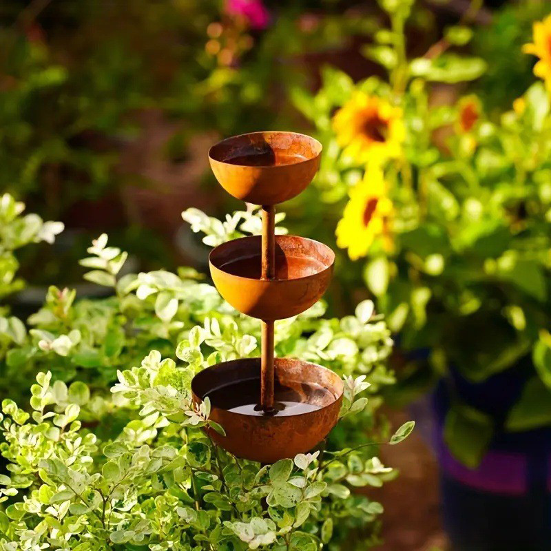 Aviora™ three-tier bird bath and feeder station in a rustic metal design