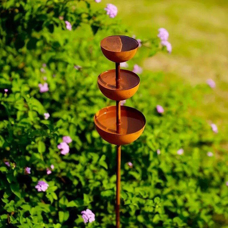 Aviora™ three-tier bird bath and feeder station in a rustic metal design
