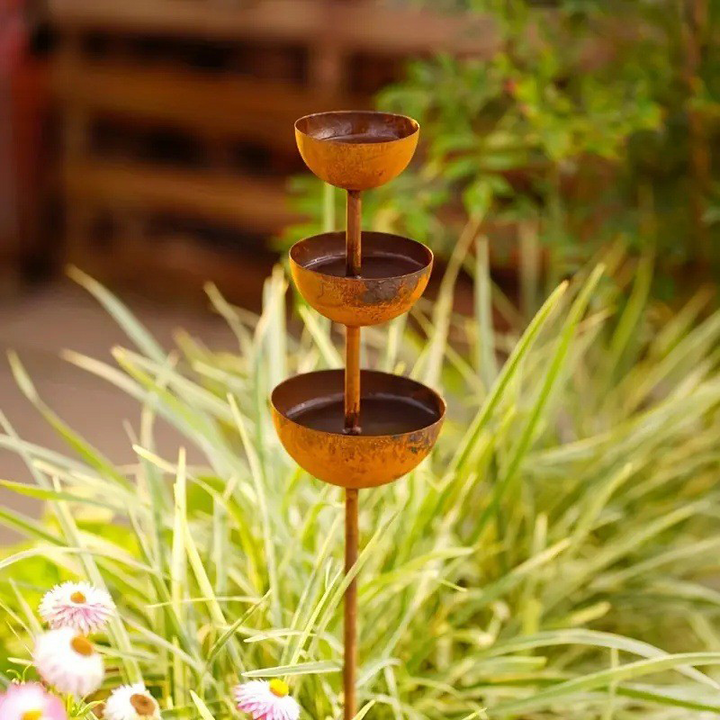 Aviora™ three-tier bird bath and feeder station in a rustic metal design